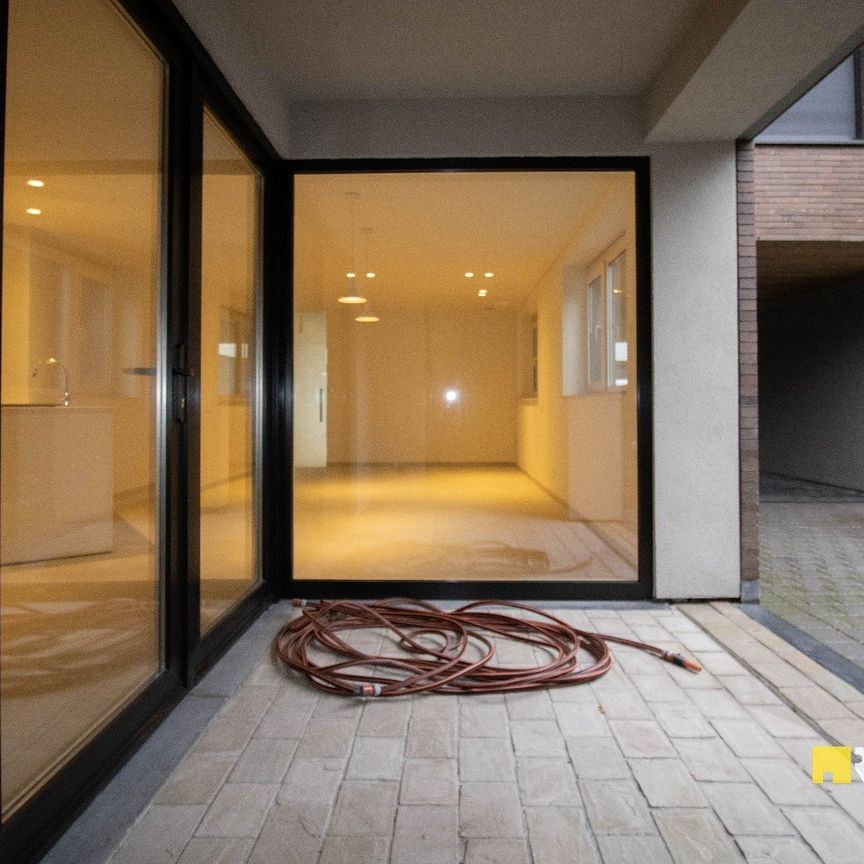 Luxueus afgewerkt nieuwbouwappartement op het gelijkvloers met terras - Foto 1