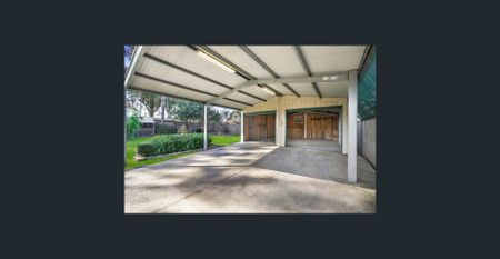 This great family home is especially exciting as you have a large back yard with double garage, double carport which is so hard to find. - Photo 5