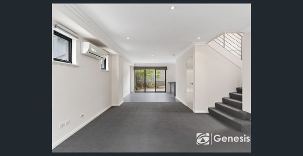 Modern 3 Bedroom Townhouse in Excellent Location - Photo 1