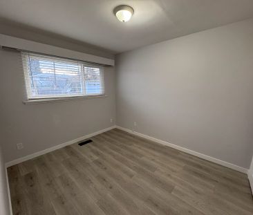 Central – 2 bed, 1 bath main floor suite - Photo 4