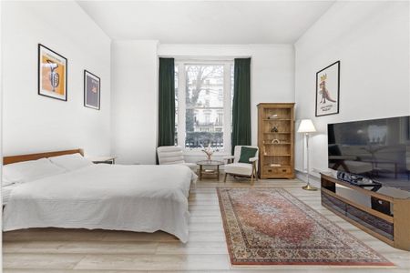 A beautifully refurbished, high spec studio apartment situated on the prestigious Westbourne Terrace, W2, offered in exceptional condition throughout. A rare and valuable benefit for this Central London location, the property also includes offstreet parking EPC rating: E - Photo 3