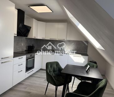 Dachgeschosswohnung in Düsseldorf (Altstadt) - Photo 1