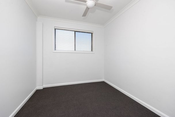 Renovated Three-Bedroom Unit in Commercial Precinct - Photo 1