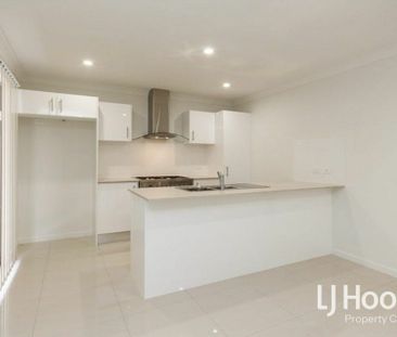 Modern Family Home with Stylish Finishes & Low-Maintenance Living - Photo 4