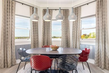 A stunning and spacious three bedroom apartment set within a gated development, benefitting with views across the communal gardens and off-street parking. - Photo 2