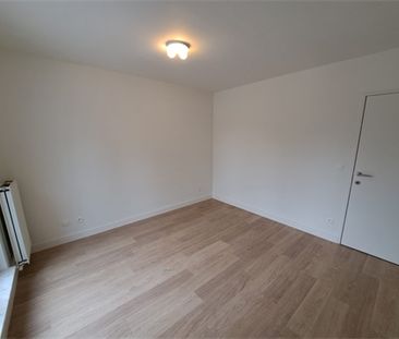 Een vernieuwd appartement op de eerste verdieping met autostaanplaats - Foto 1