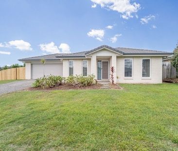 Spacious 4 bedroom home on a large block - Photo 1