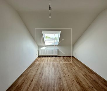 Erstbezug nach Modernisierung von heller gemütlicher 4-Zimmer-DG-Wohnung - Photo 3