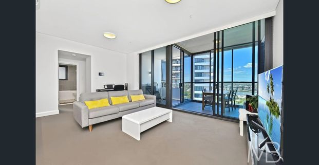 PENTHOUSE-STYLE APARTMENT WITH 270 DEGREE WATER & CITY VIEWS - Photo 1
