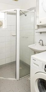 TOP FLOOR NICELY FURNISHED STUDIO WITH A CAR SPACE - Photo 4