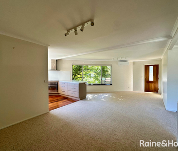 Light-Filled Living with Balcony - Photo 1