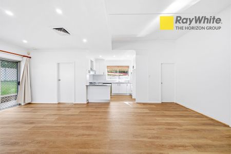 Renovated and Spacious 4-Bedroom Family Home | Walk to Eastwood Shops & Schools - Photo 3
