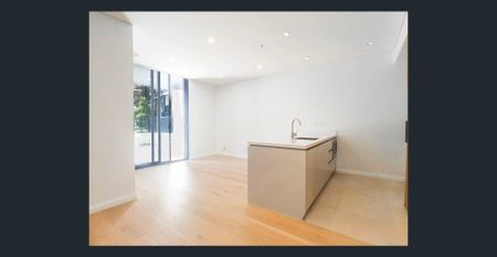 Furnished one bedroom ground floor unit - Photo 3