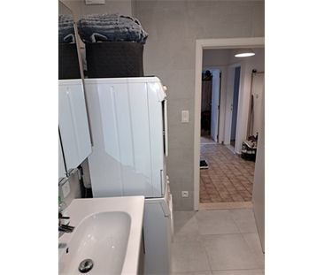 Een appartement op de eerste verdieping met garage en tuintje - Foto 6