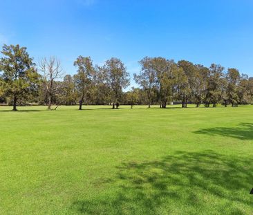 Expansive Six-Bedroom Home in Peaceful Riverside Pocket - Photo 2