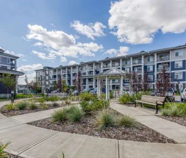 2 BED & 1 BATH TOP FLOOR CONDO WITH A/C, HEATED UNDG PARKING & GREA... - Photo 1