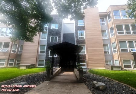 GREAT 2 BED+DEN, 2 BATH CONDO WITH IN-SUITE LAUNDRY & HEATED UNDERGROUND PARKING IN THE COMMUNITY OF OLIVER - Photo 5