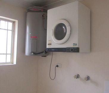 "SPACIOUS TWO BEDROOM UNIT WITH DOUBLE TANDEM GARAGE'' - Photo 2