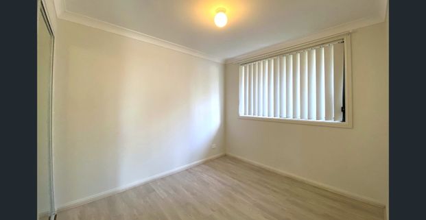 BEAUTIFUL FLAT WITH OFF STREET PARKING! - Photo 1