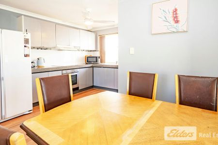 LAID BACK FAMILY LIVING WITH SIDE ACCESS AND LARGE, POWERED WORKSHOP - Photo 2