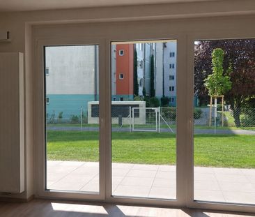 Moderne Gartenwohnung mit Terrasse in neuwertigem Wohnkomplex - Photo 1