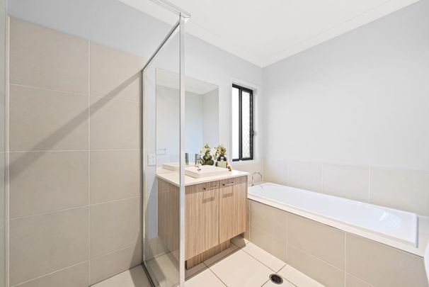 Stylish Double-Storey Home with Space and Comfort - Photo 1