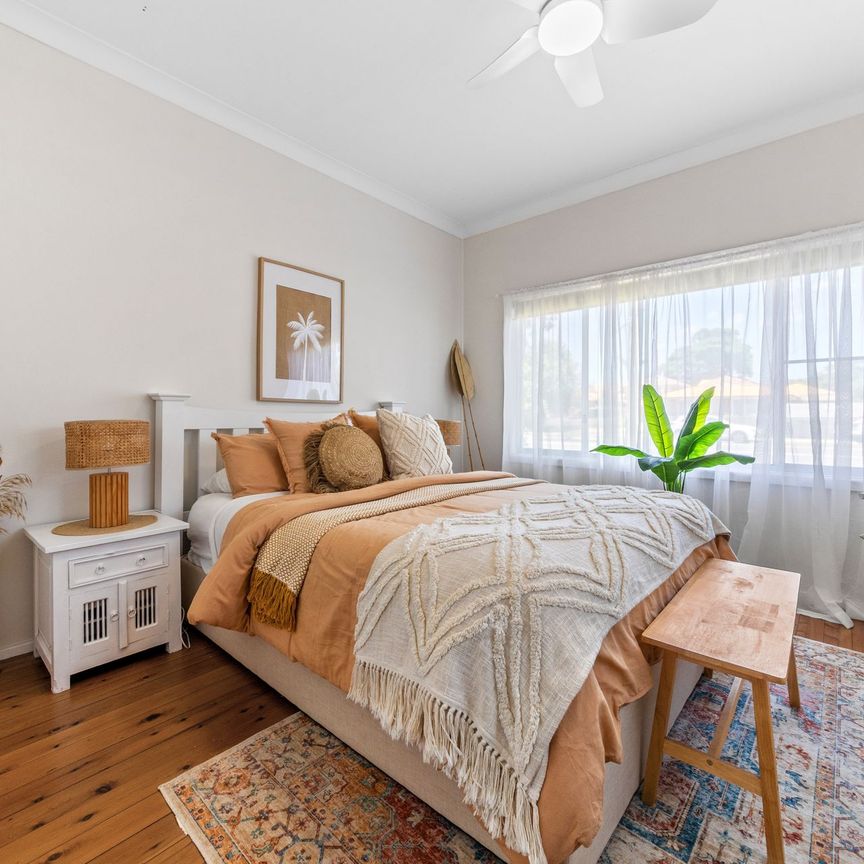 Coastal Cottage Charm Backing Onto Budgewoi Reserve! - Photo 1