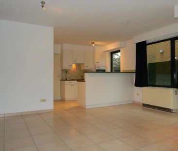 Gezellig gelijkvloersappartement met zonnige tuin en garage - Photo 1