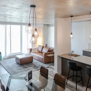 Grand 2 Chambres & 1.5 Salle De Bain - Photo 2