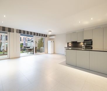 Gelijkvloers appartement met tuintje in centrum Sint-Antonius - Foto 4