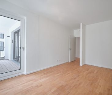 Moderne 2-Zimmerwohnung mit Einbauküche und großzügiger Terrasse. - Photo 1