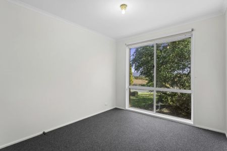 Comfortable & Well-Laid-Out 3-Bedroom Home with Versatile Living Spaces - Photo 3