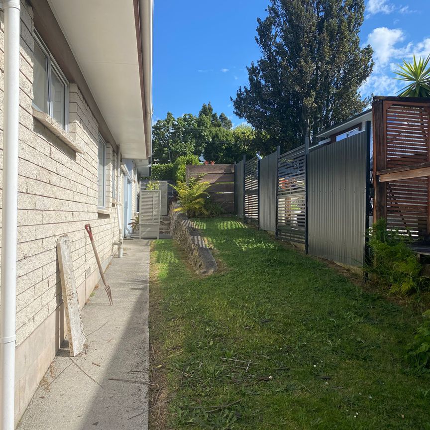 This brick and tile rear unit is in such an excellent location - Photo 1