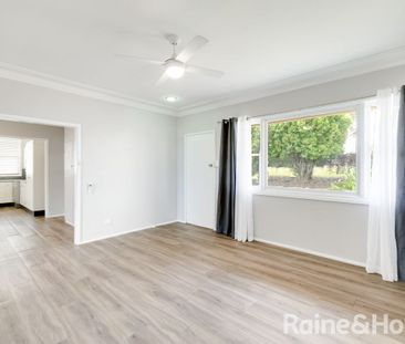 UPDATED THREE BEDROOM HOME IN CENTRAL LOCATION - Photo 2
