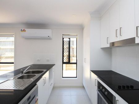 Modern 4-Bedroom Home in Sought-After Harristown Estate - Photo 3