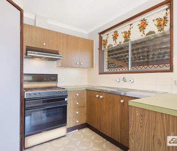 Three Bedroom Home with Large Yard - Photo 3