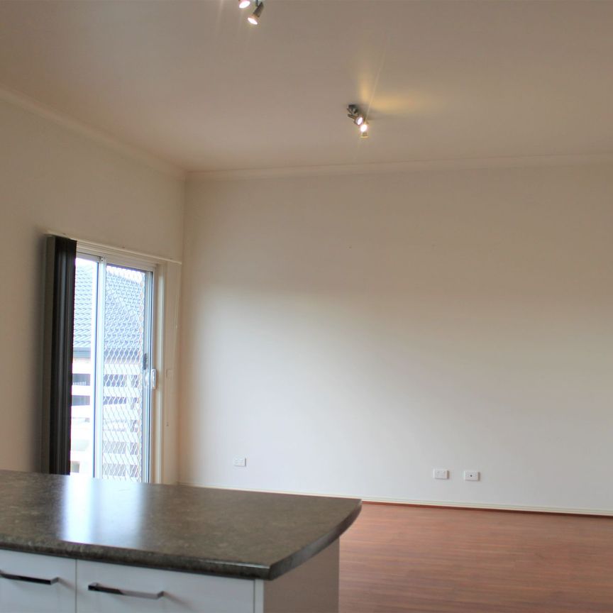 MODERN TOWNHOUSE PACKED WITH FEATURES! - Photo 1