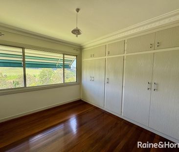 ELEVATED FARMHOUSE WITH SHED - Photo 5