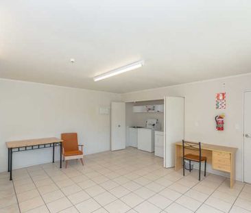 These fully furnished studio units have fresh carpet and paint, cre... - Photo 3