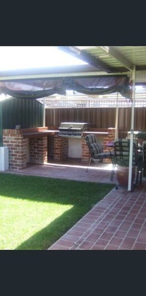 Spacious & Comfortable 4 Bedroom Family Home with carport - Photo 1