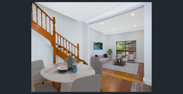 Private, Sun-Drenched Semi Offering Effortless Indoor-Outdoor Living - Photo 1