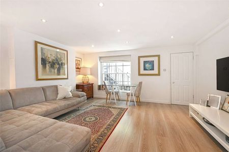 A bright two bedroom apartment with a private entrance, private patio space as well as access to the beautiful Brompton Square Communal Gardens - Photo 2