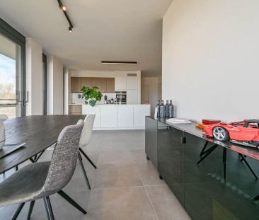 Uniek bijna energieneutraal hoekappartement met ruim terras - Photo 3
