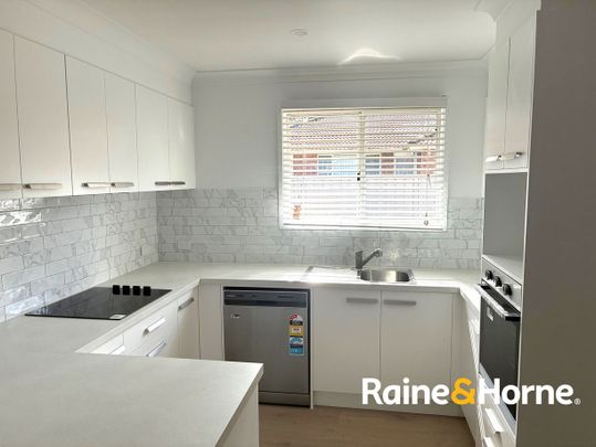 Neat and Tidy Unit!!! - Photo 1