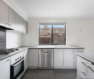 Spacious 4-Bedroom Family Home with Modern Comforts - Photo 1