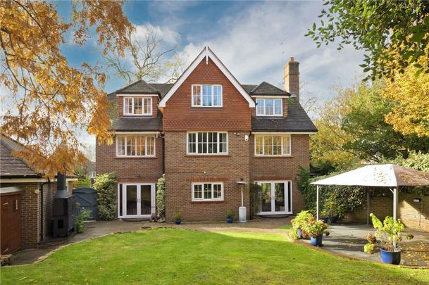 Seven bedroom home in private road close to St John's School. - Photo 1