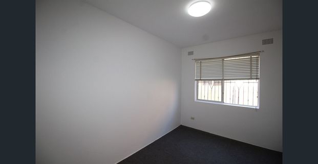 FRESHLY PAINTED TWO BEDROOM UNIT - Photo 1