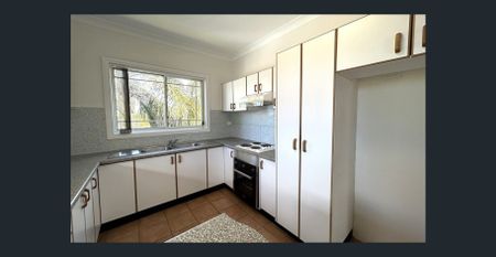 Spacious 3-Bedroom Home in Prime Location - Photo 3