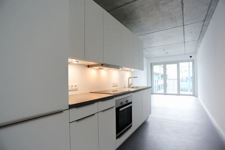 Ab sofort - Neubauwohnung mit Sichtbetondecken, EBK und Smart Home-Features - Photo 4