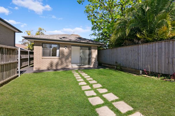 Modern Flat with Backyard - Photo 1